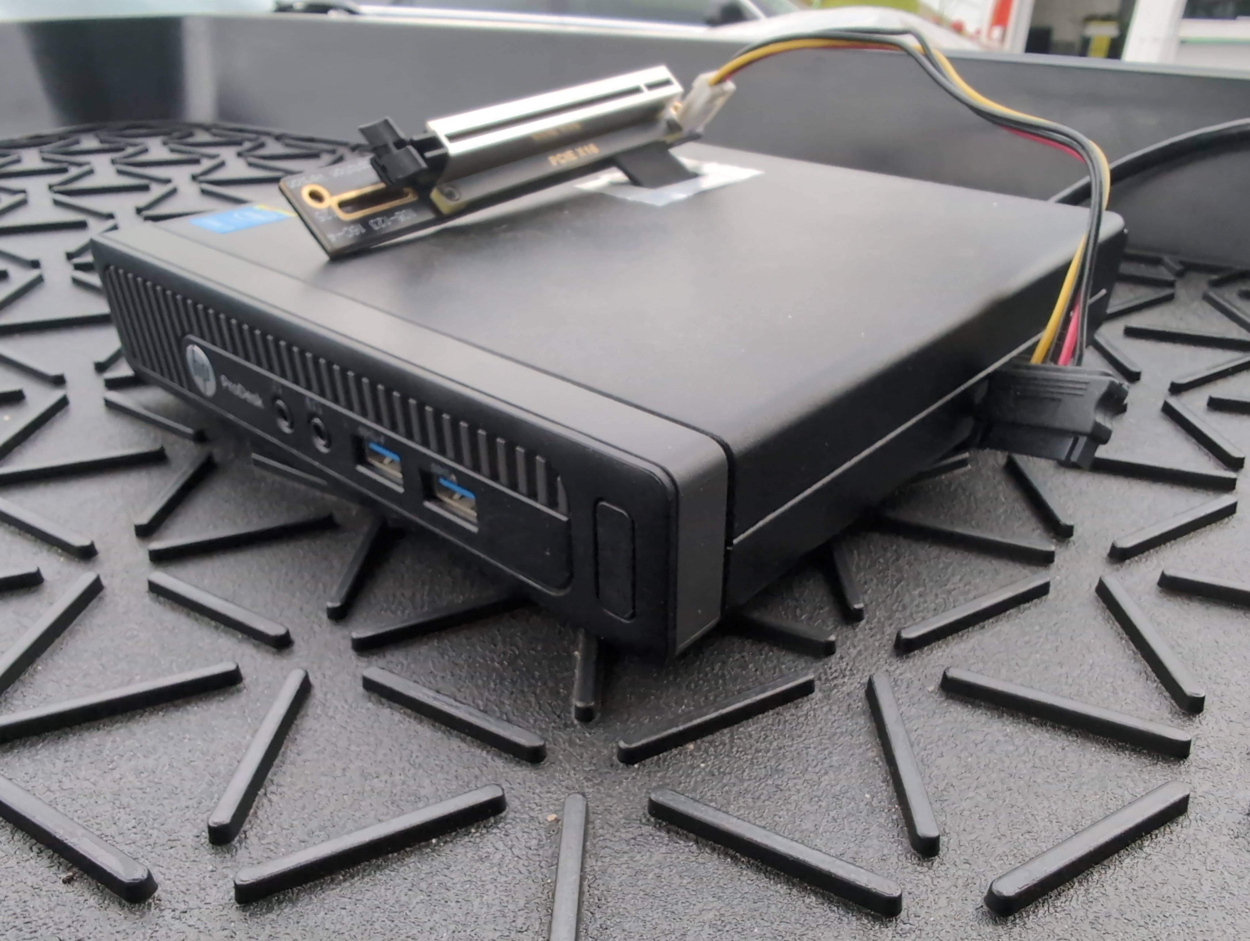 HP ProDesk 600 G1 DM with an NVMe-to-PCIe adaptor installed through a hole in the case